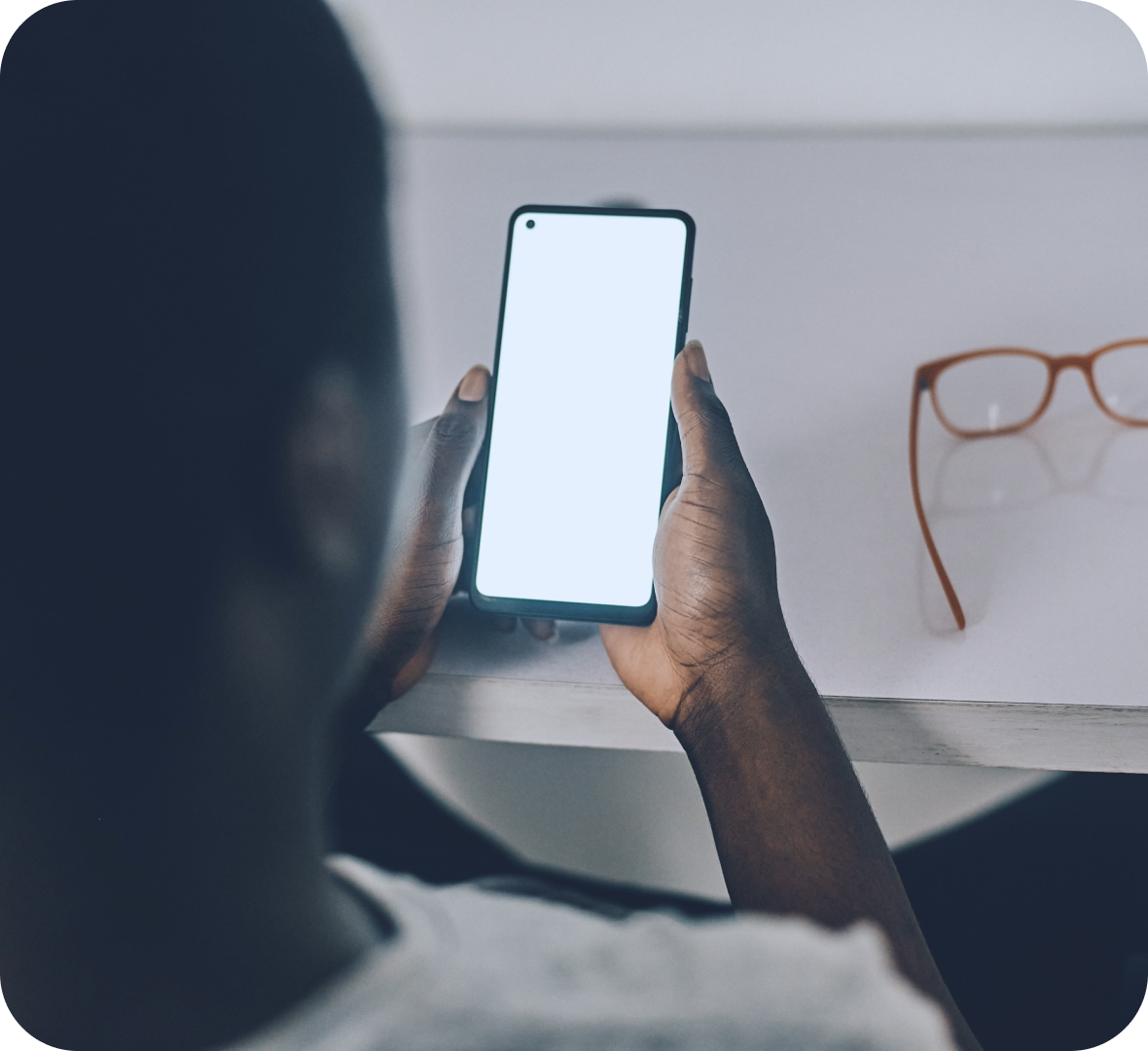 Person using mobile phone for cost-effective calling